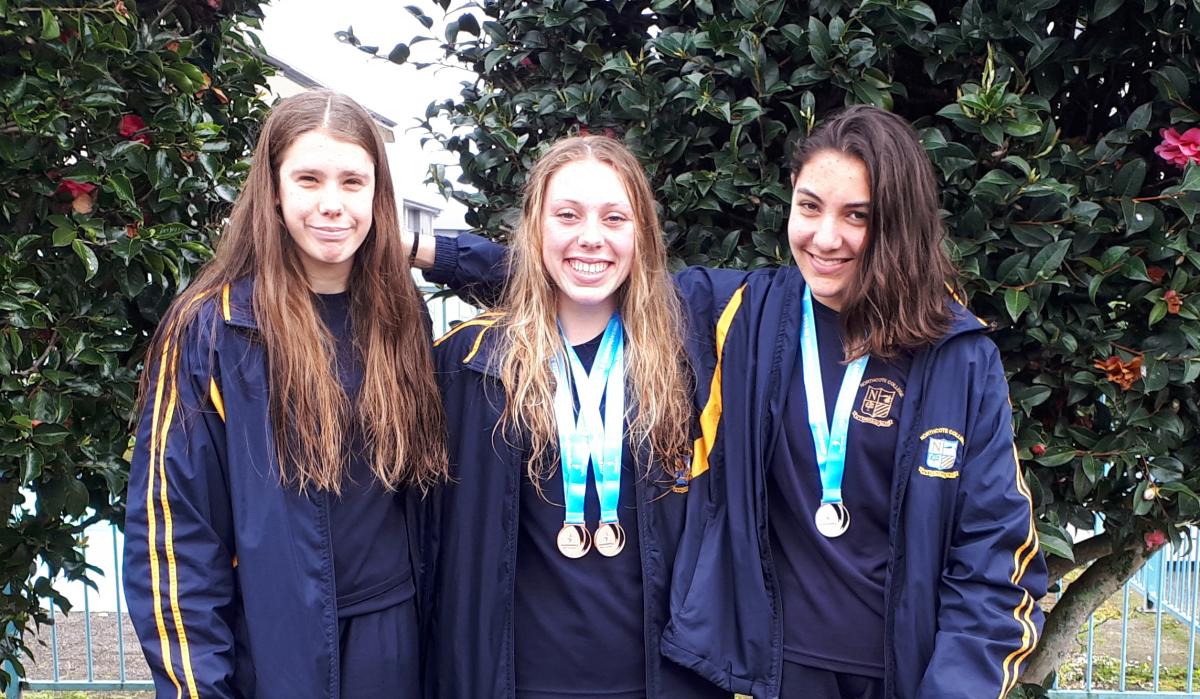 Daria Barbina, Rebecca Wilkins and Kaia Swiggs at the NZ Secondary Schools Swimming Champs